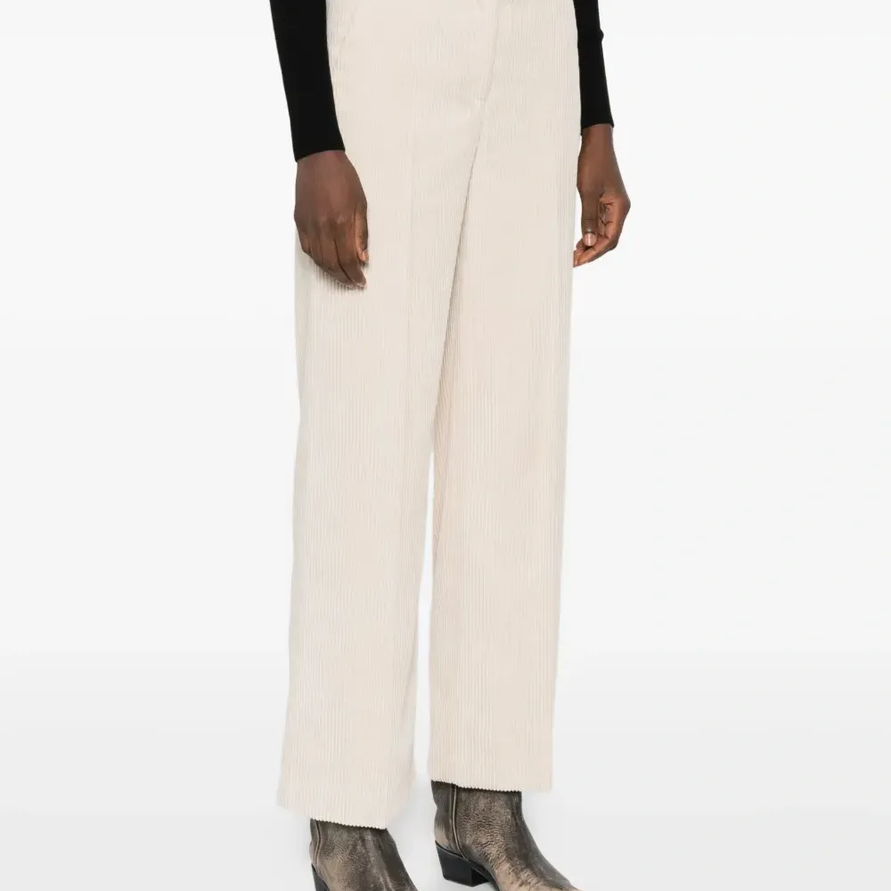 Брюки в рубчик с карманами