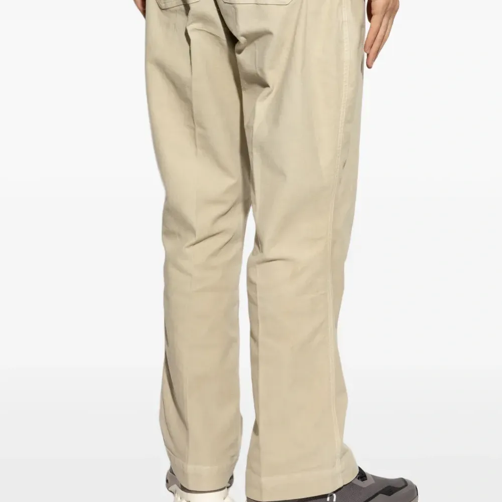 Брюки на пуговицах Брюки на пуговицах