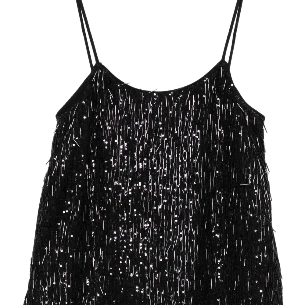 Топ с пайетками и бахромой Топ с пайетками и бахромой