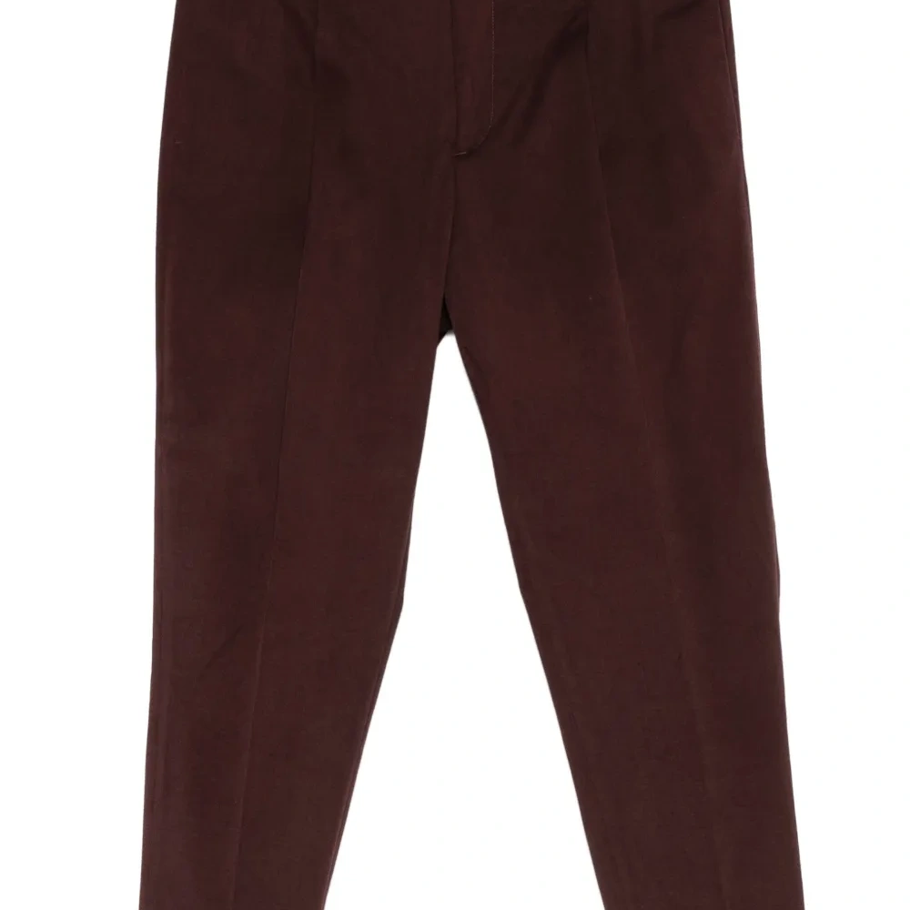 Плиссированные брюки