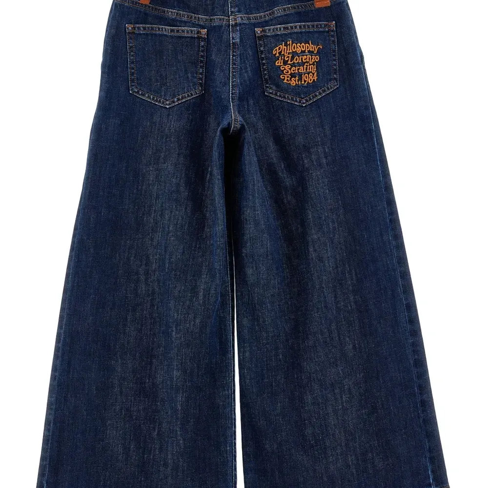 Джинсы со складками