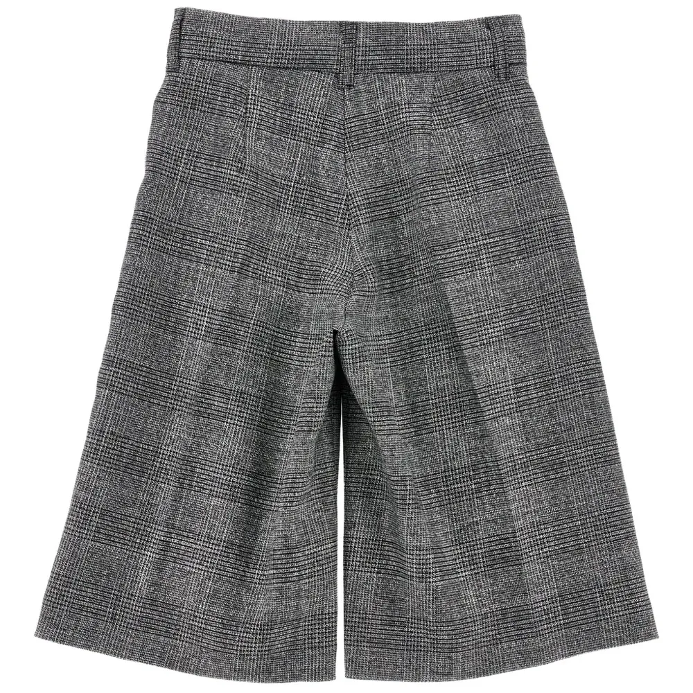 Клетчатые брюки со складками