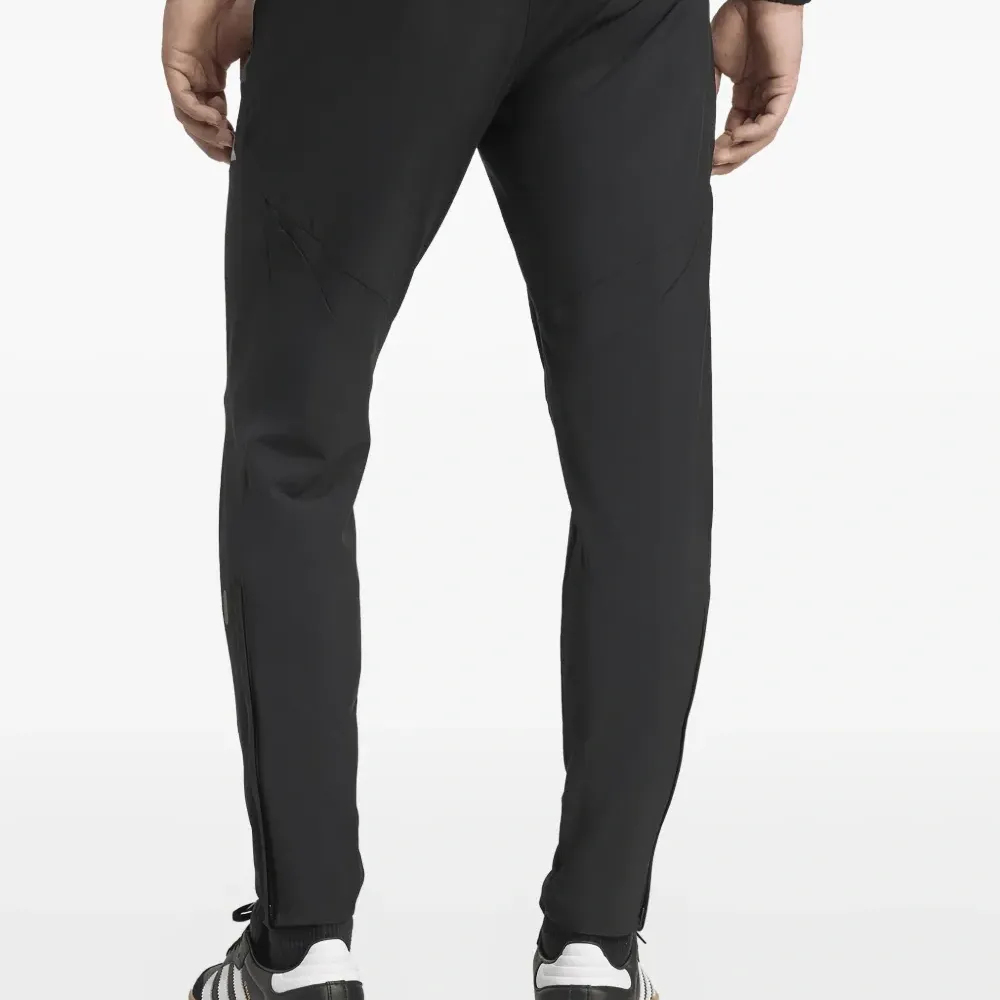 Спортивные брюки Tiro 25 из коллаборации с Manchester United