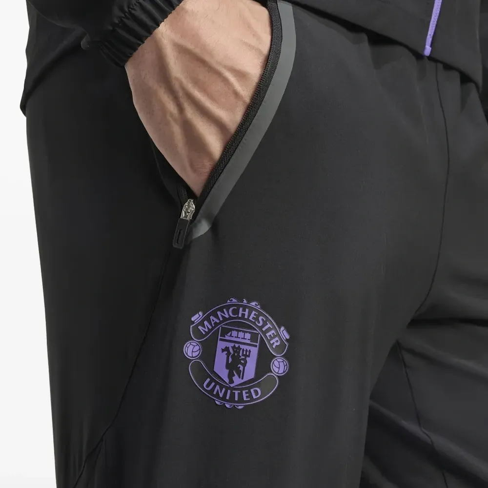 Спортивные брюки Tiro 25 из коллаборации с Manchester United