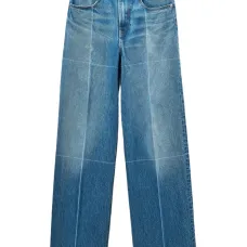 Джинсы с эффектом потертости и вставками