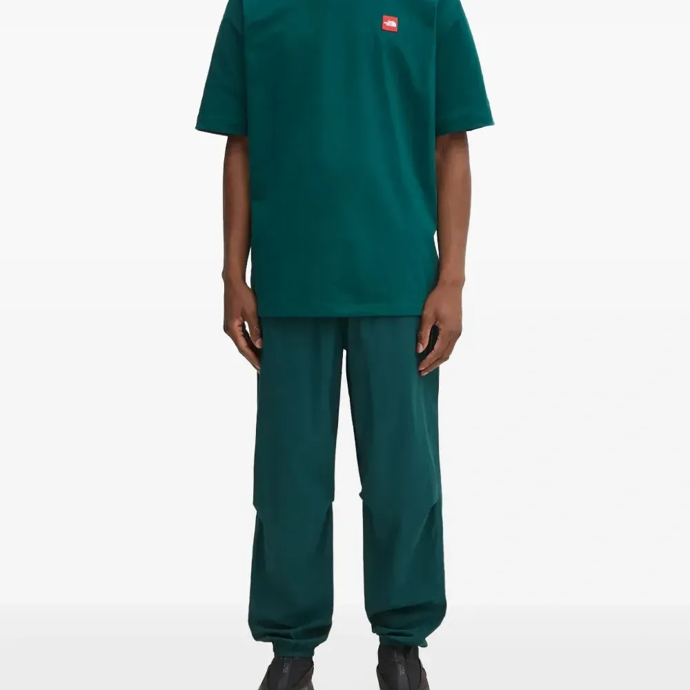 Брюки с карманами на молнии