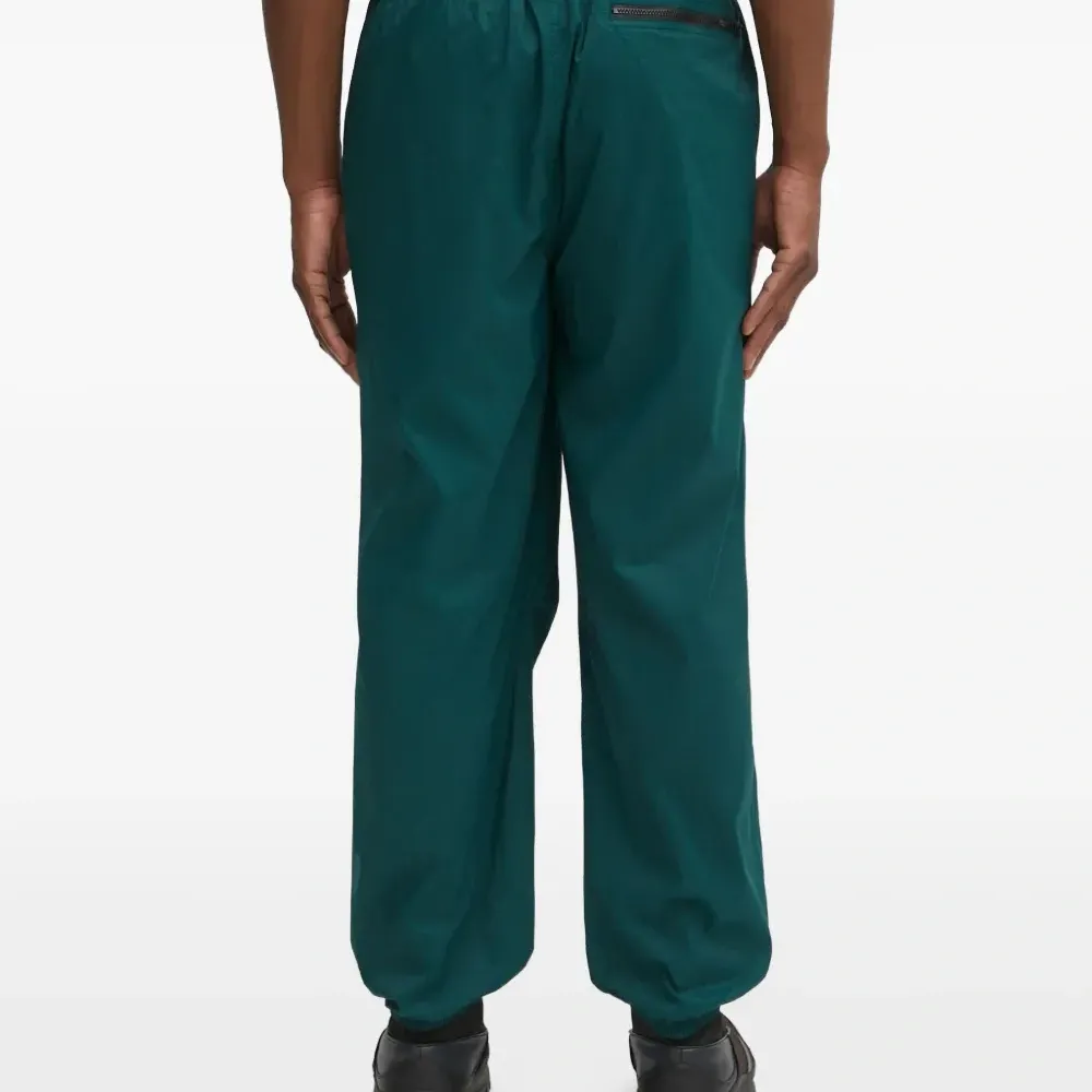 Брюки с карманами на молнии