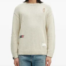 Свитер с эффектом потертости и вышивкой