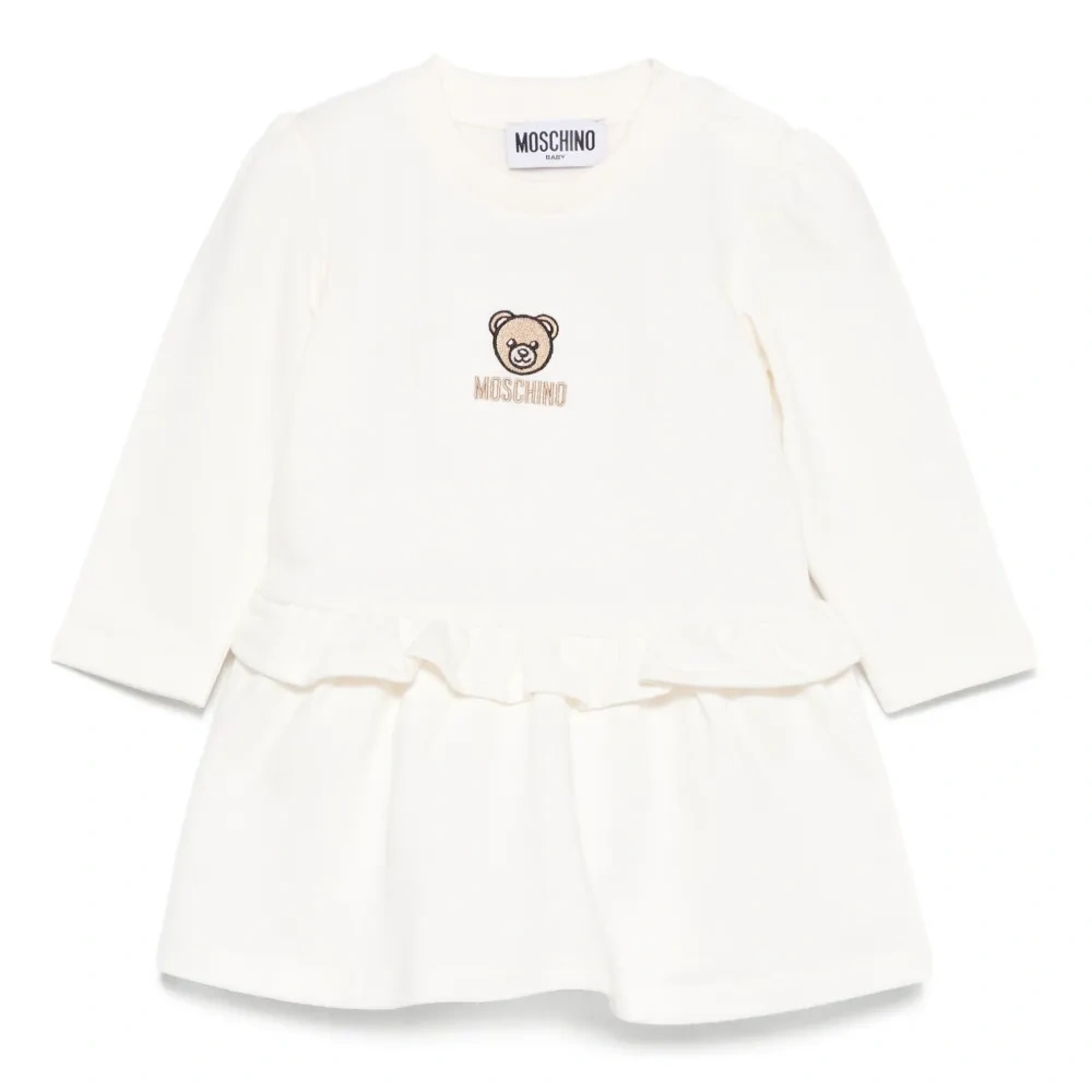 Платье с оборками и вышивкой