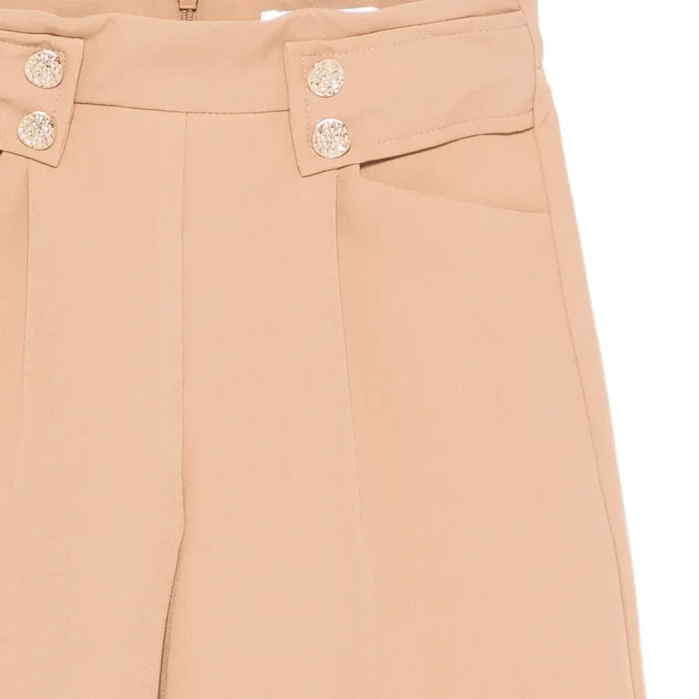 Брюки с манжетами на пуговицах