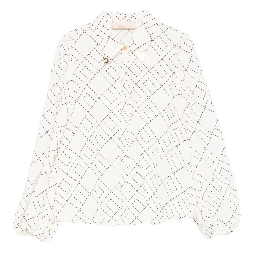 Блузка с объемными рукавами и геометричным принтом