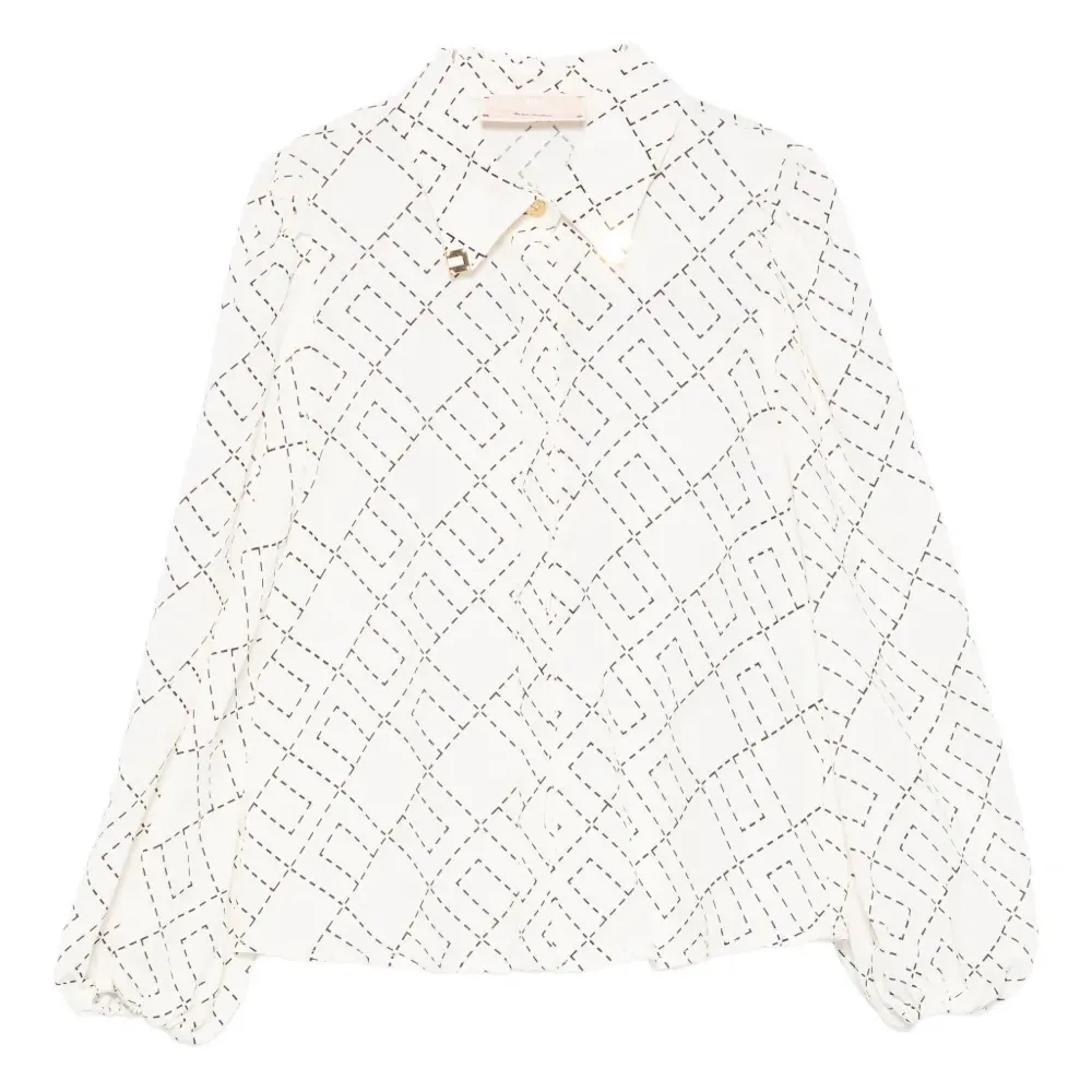 Блузка с объемными рукавами и геометричным принтом