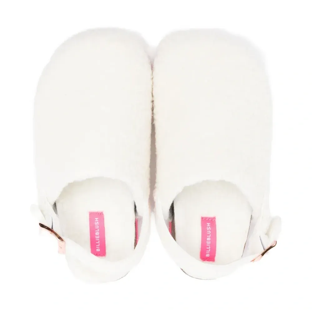 Пушистые слиперы с ремешком на пятке