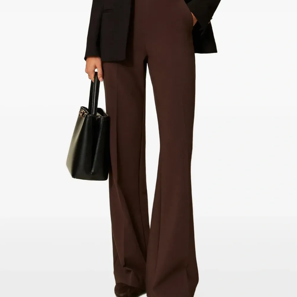 Расклешенные брюки с завышенной талией