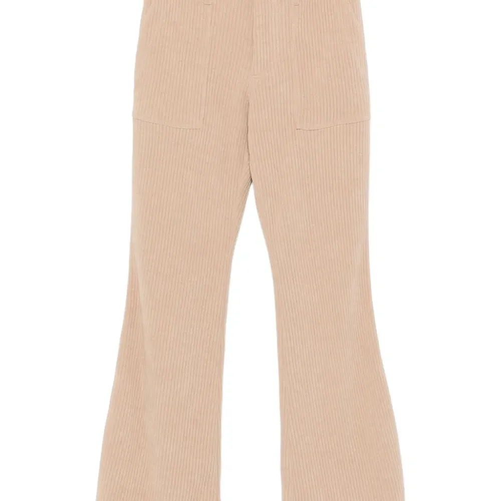 Расклешенные брюки в рубчик