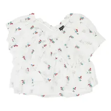 Блузка с оборками и цветочной вышивкой