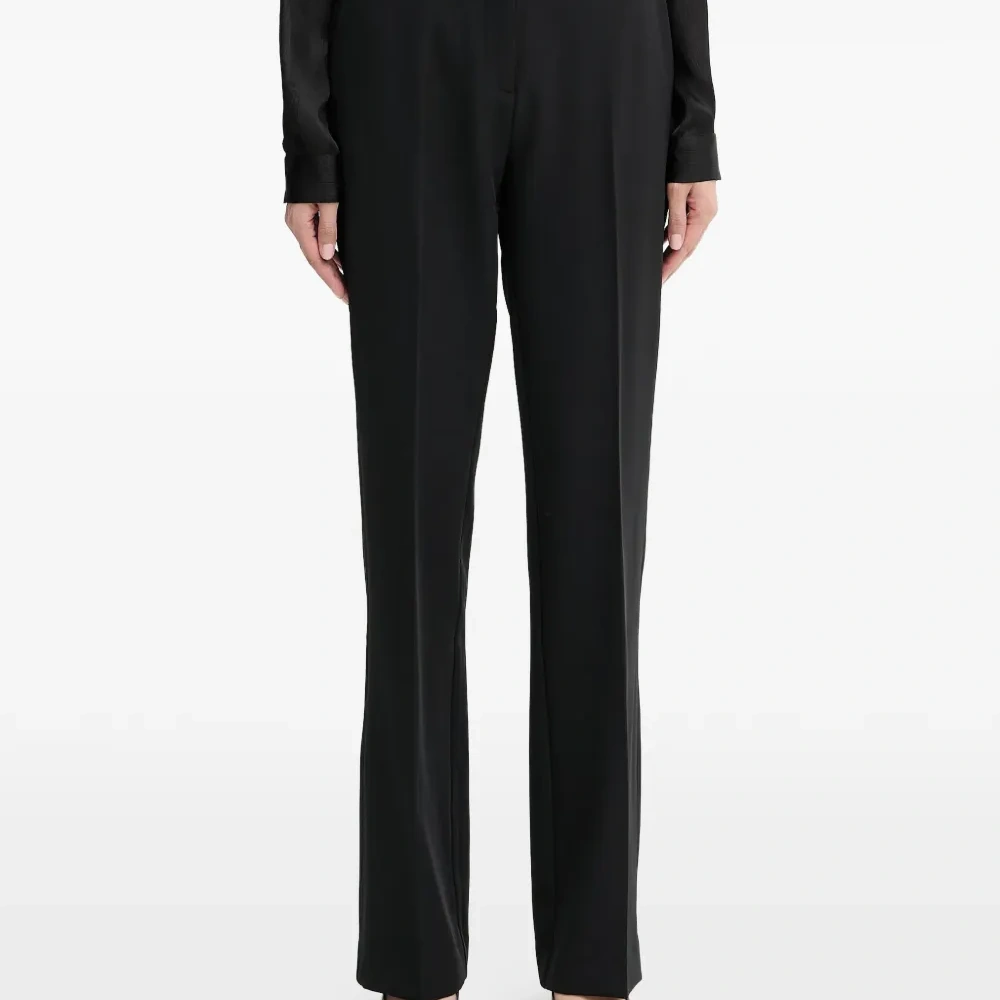 Брюки с застежкой на пуговицах