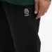 Джоггеры с манжетами и нашивкой-логотипом