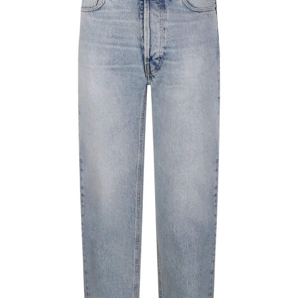 Джинсы с эффектом потертости