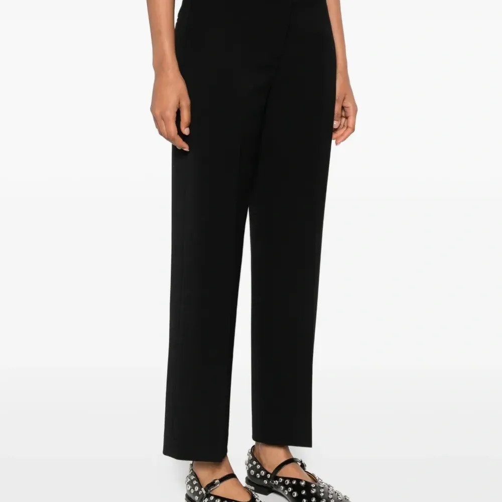 Брюки с застежкой на пуговицах