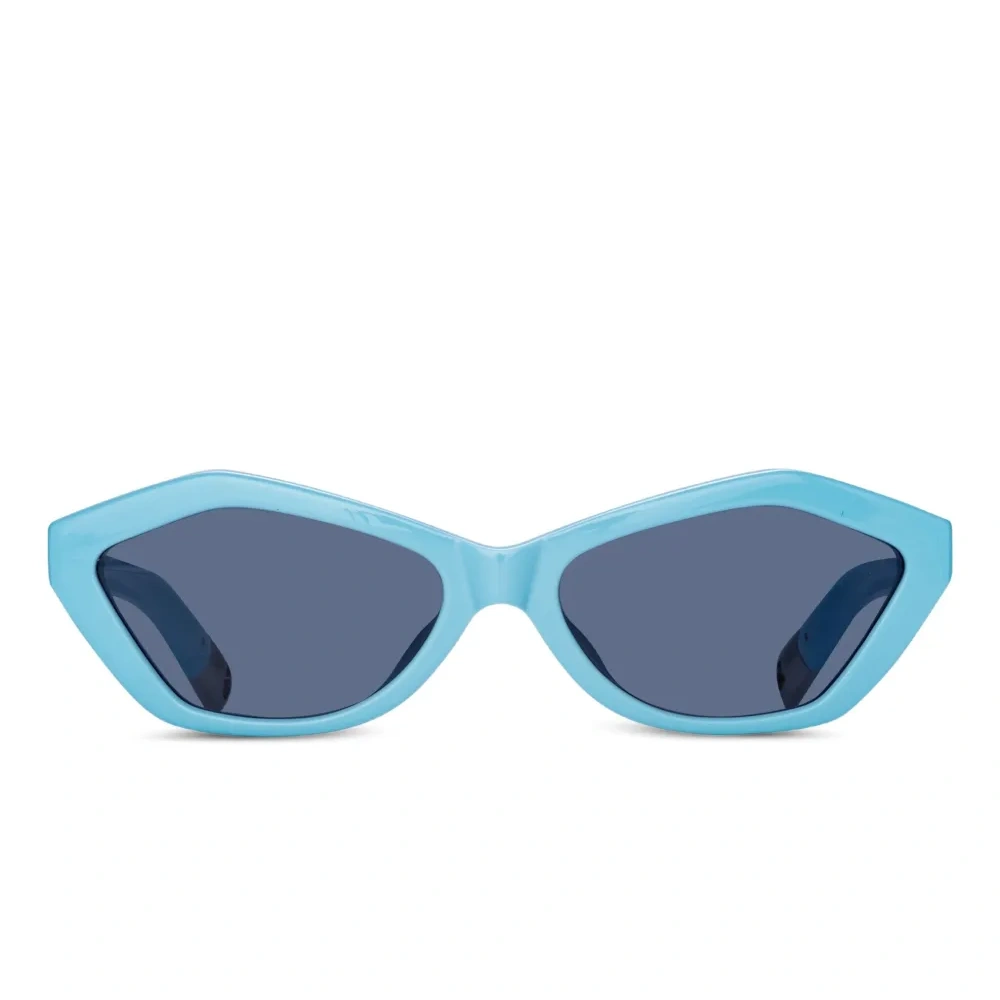 Солнцезащитные очки в геометричной оправе