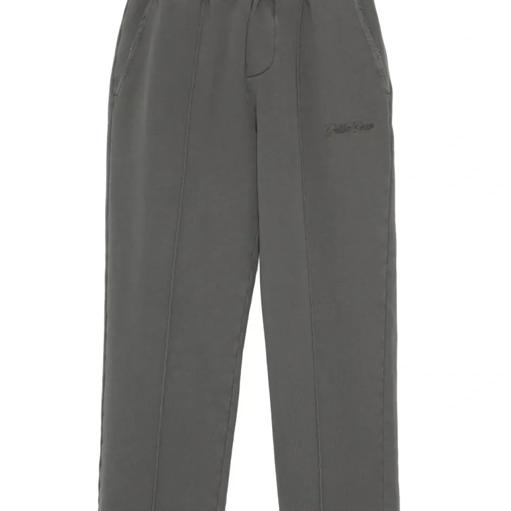 Брюки с вышитым логотипом