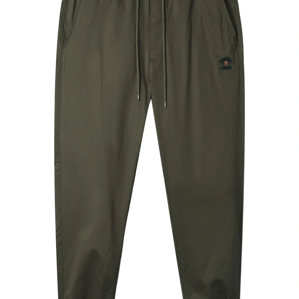 Брюки с манжетами и нашивкой-логотипом