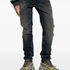 Джинсы с эффектом потертости