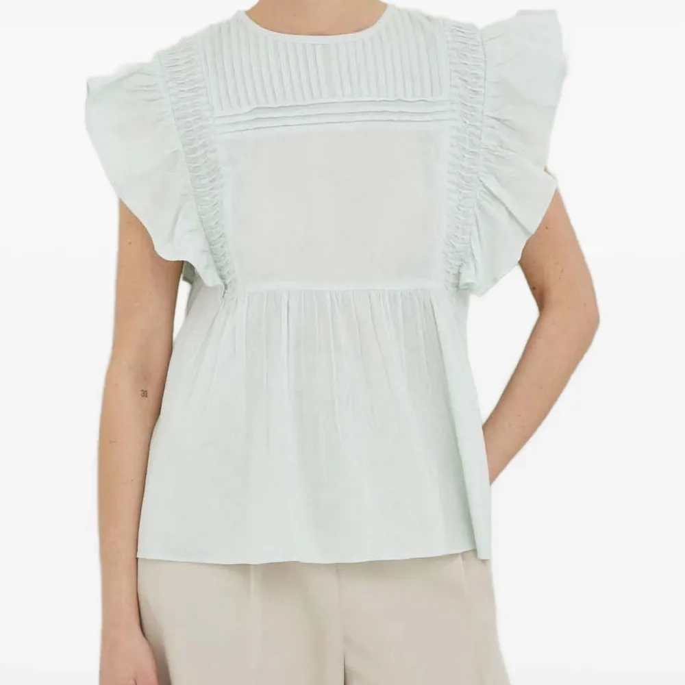 Блузка с оборками