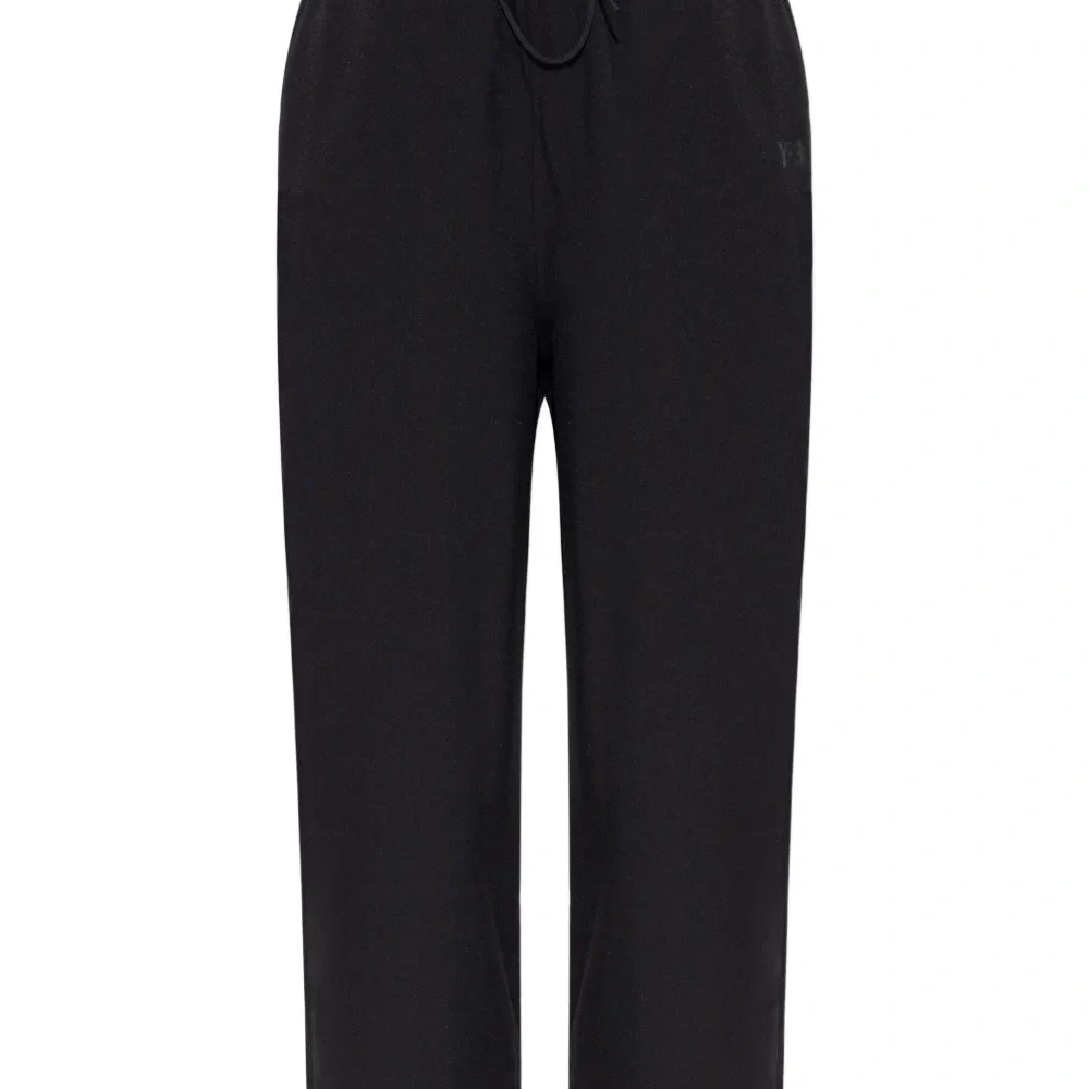 Спортивные брюки с полосками и кулиской