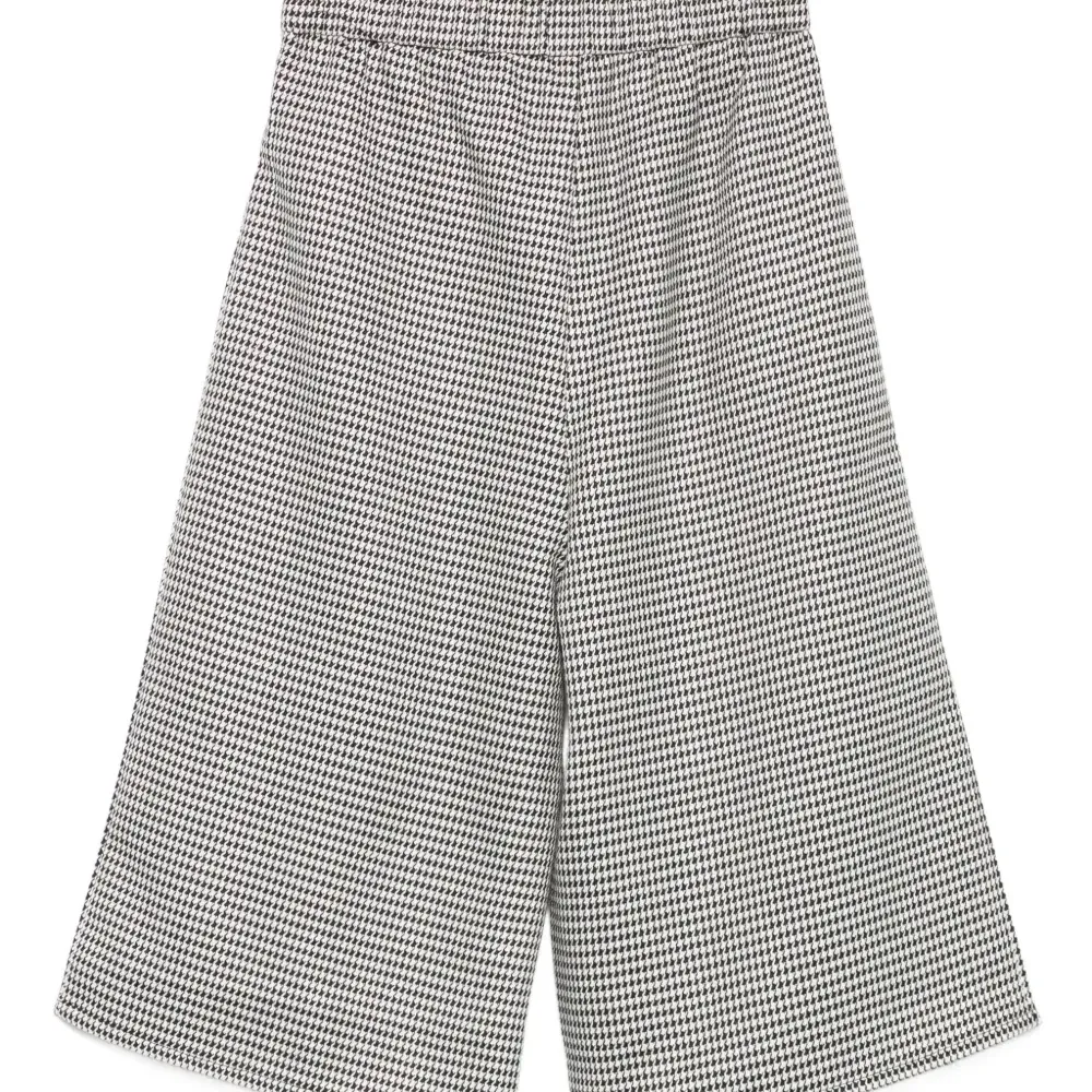 Брюки в ломаную клетку с эластичным поясом