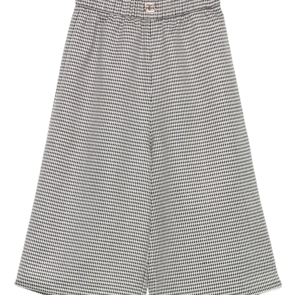 Брюки в ломаную клетку с эластичным поясом