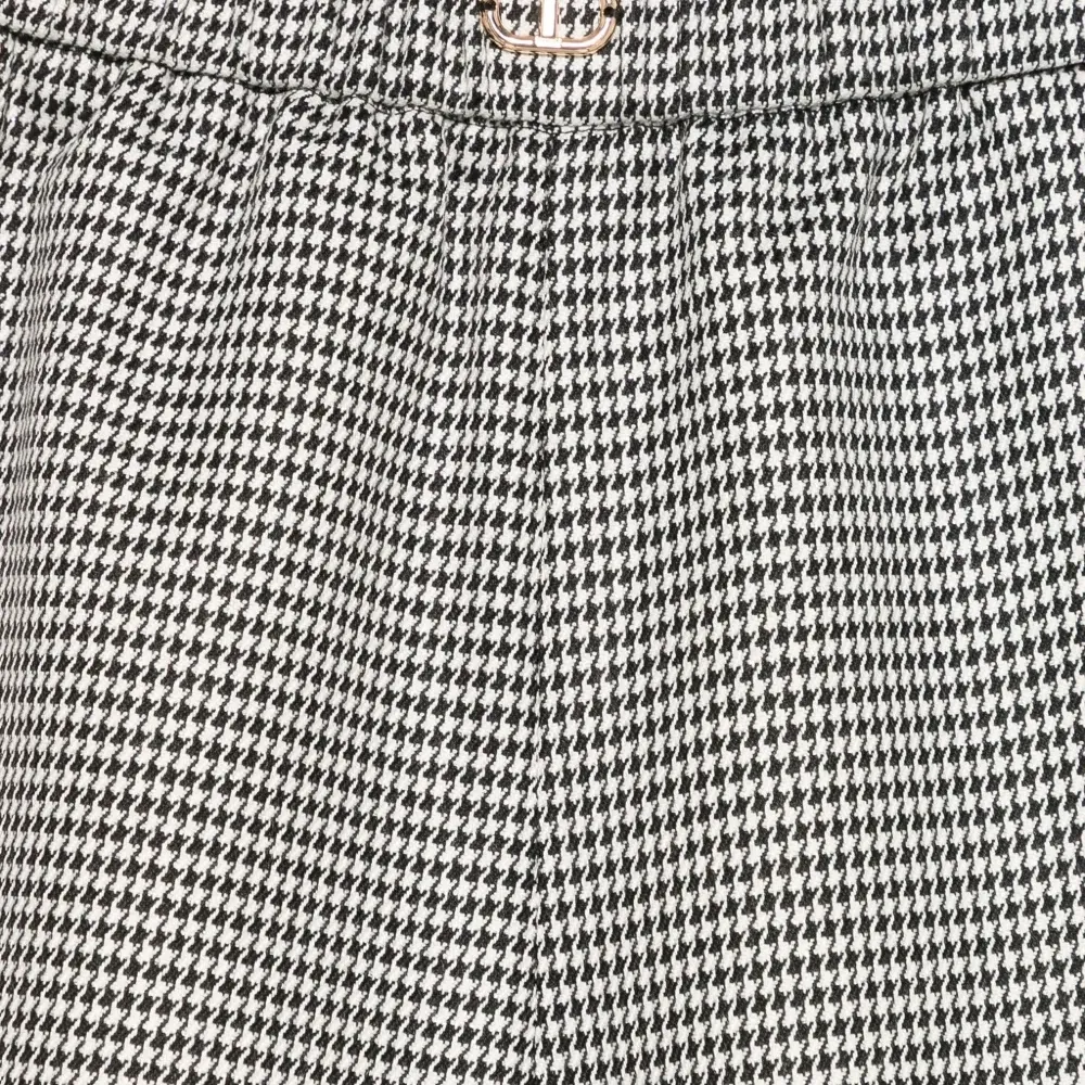 Брюки в ломаную клетку с эластичным поясом