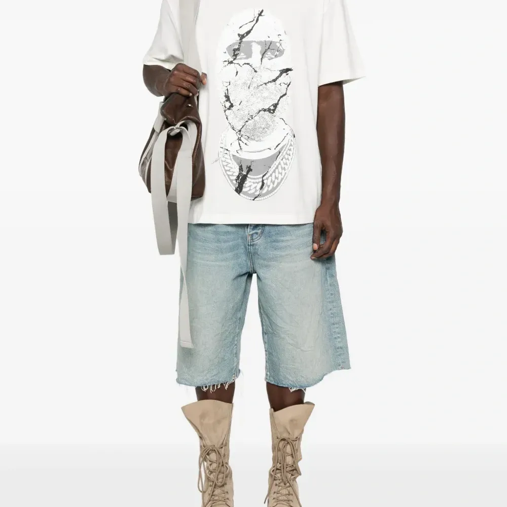 Футболка с принтом в виде растрескавшегося лица