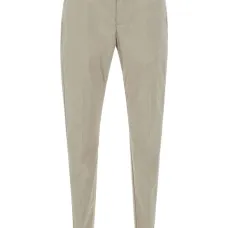 Зауженные брюки с подворотами