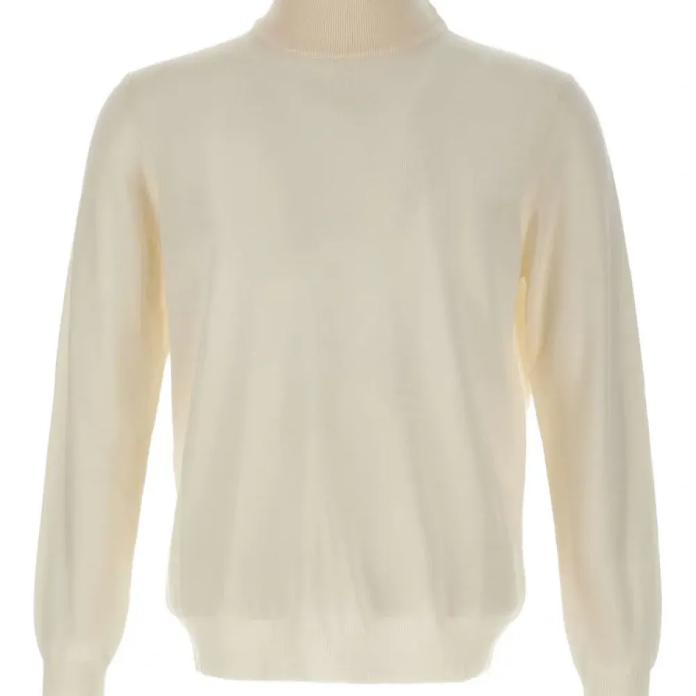 Свитер с высоким воротником и манжетами в рубчик