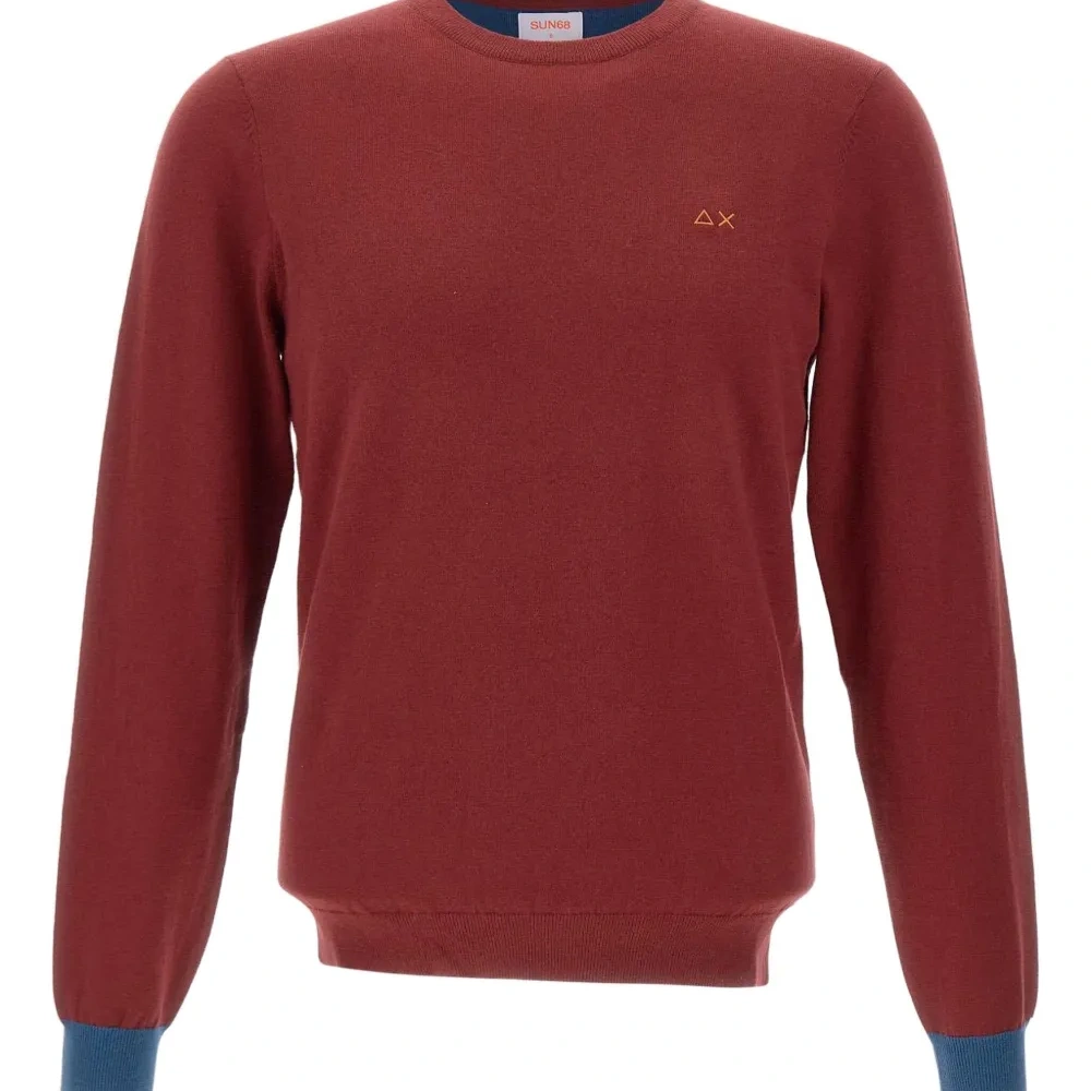 Свитер с нашивками на локтях