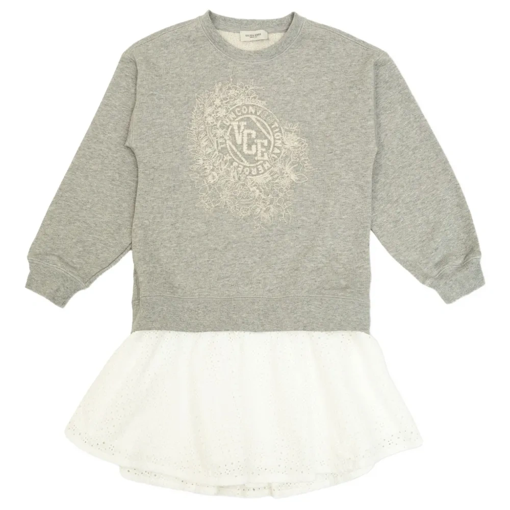 Платье с люверсами и вышивкой