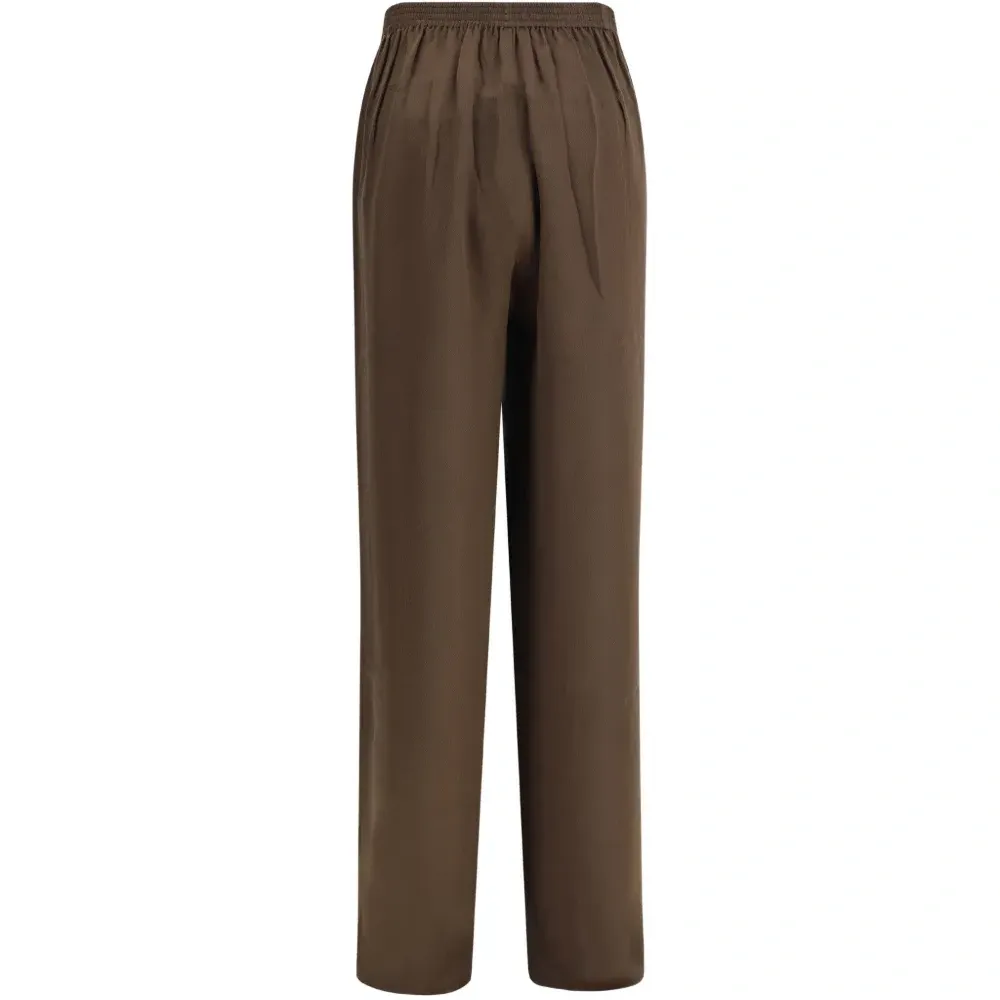 Шелковые брюки широкого кроя Шелковые брюки широкого кроя