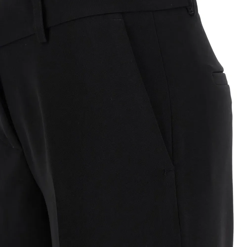 Брюки с карманами