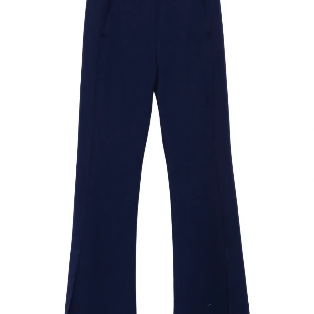 Брюки с вышивкой и разрезами