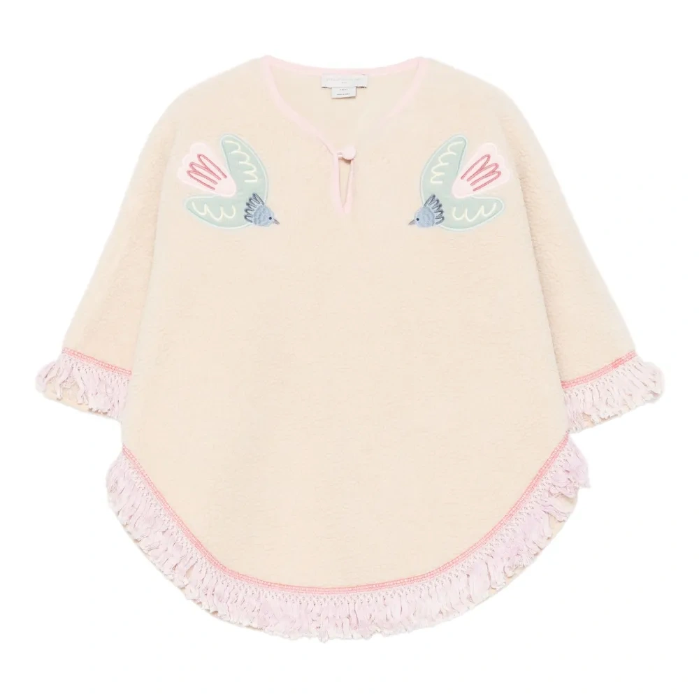 Пончо с вышивкой и бахромой