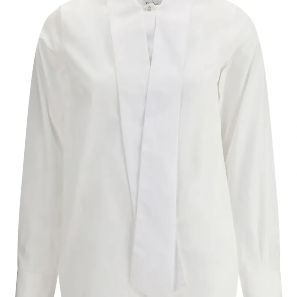 Рубашка с завязками на воротнике Рубашка с завязками на воротнике