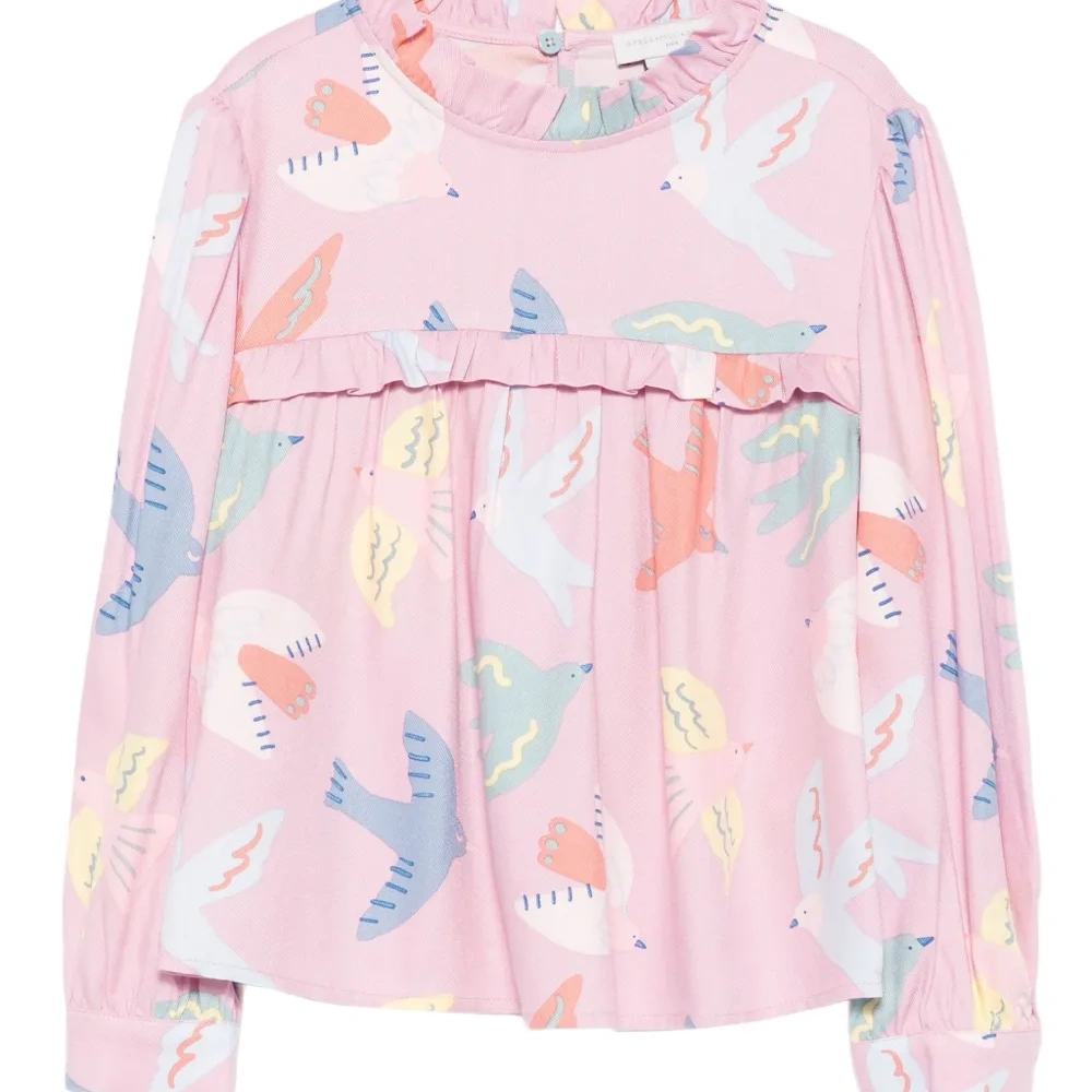 Блузка с оборками и принтом