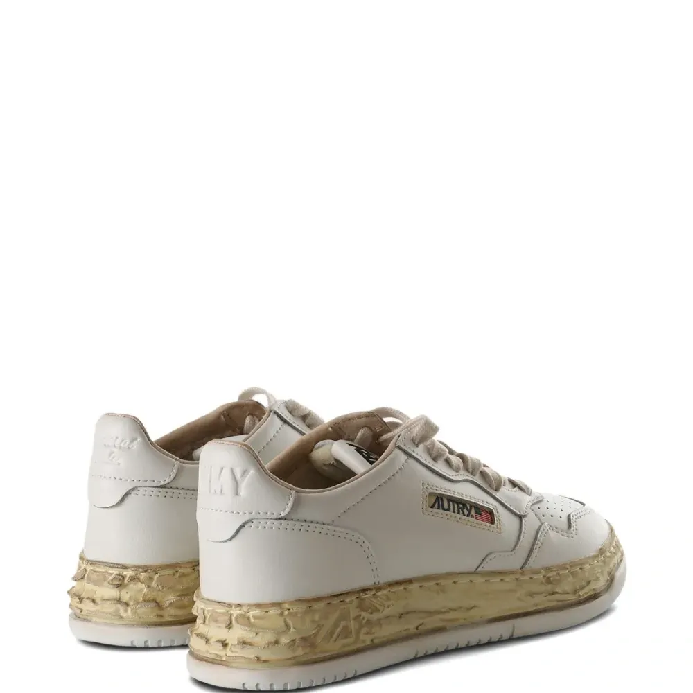 Кожаные перфорированные кеды X Autry Кожаные перфорированные кеды X Autry