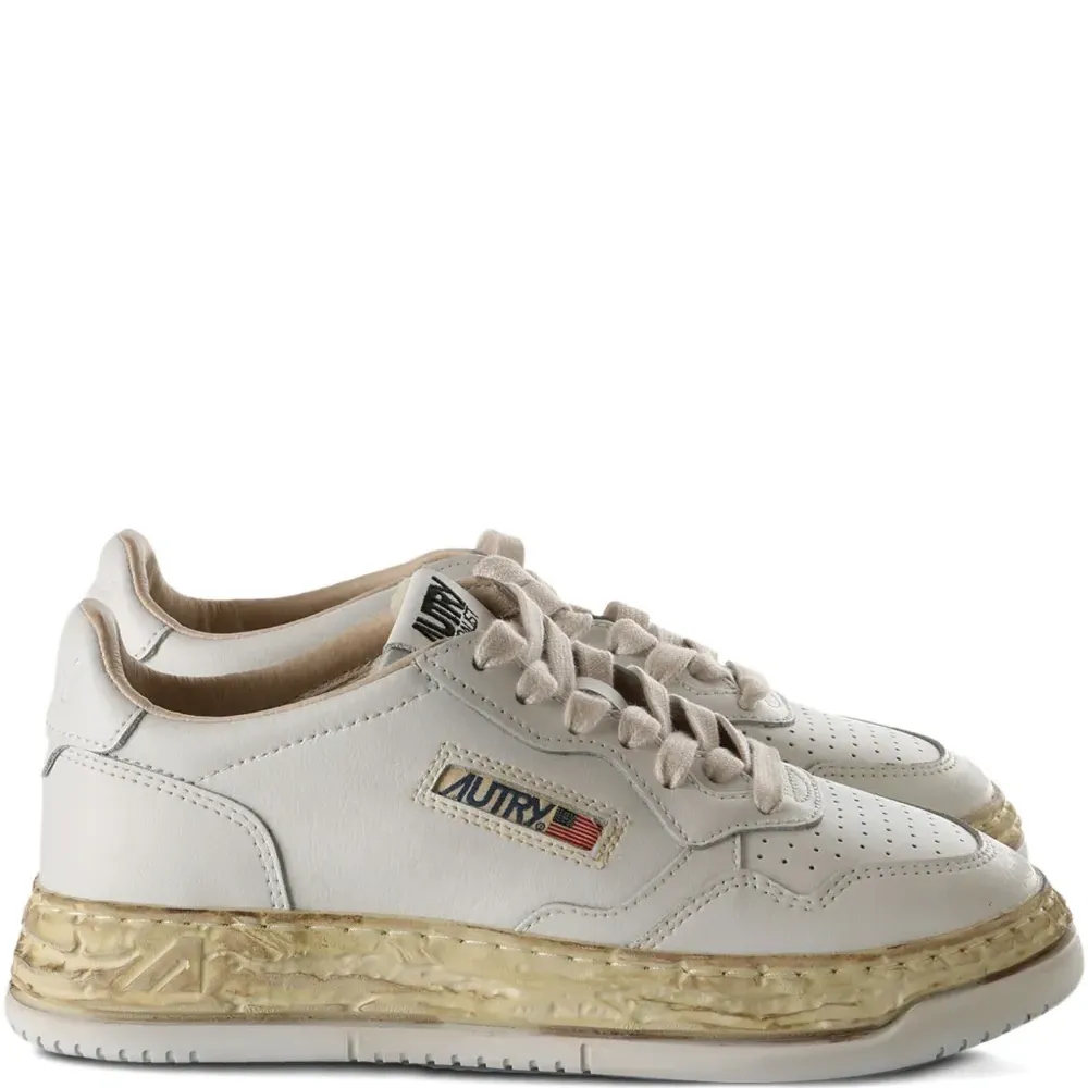 Кожаные перфорированные кеды X Autry Кожаные перфорированные кеды X Autry