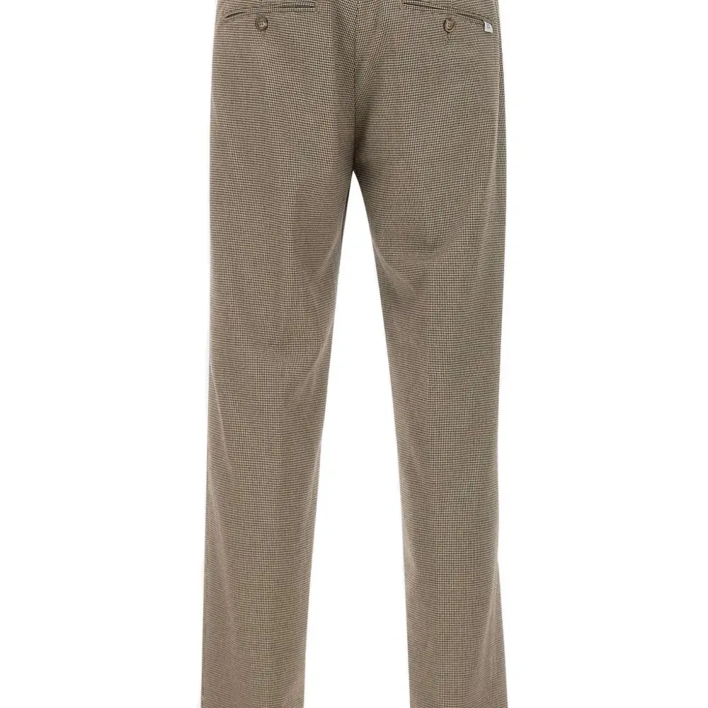 Брюки в ломаную клетку