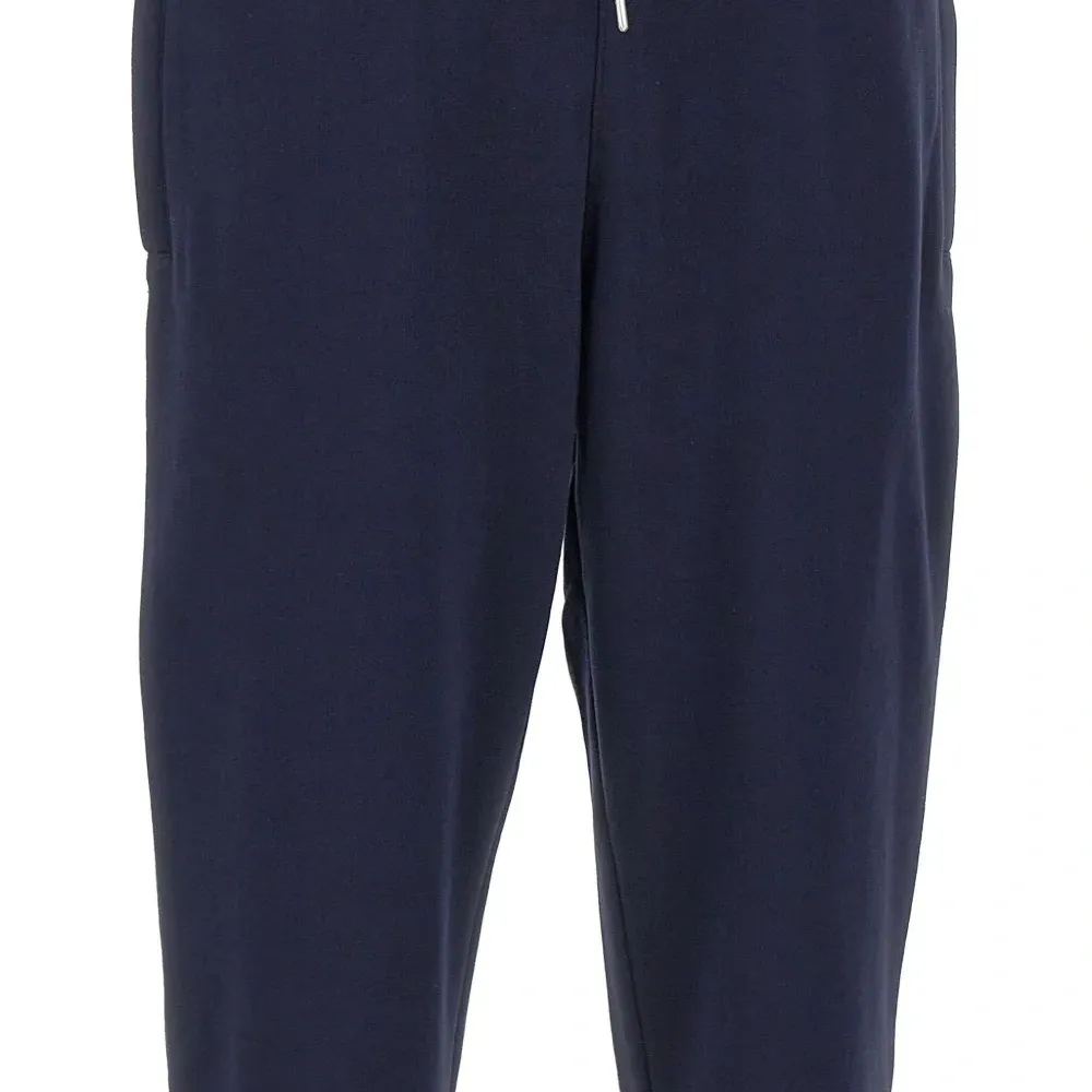 Спортивные брюки с кулиской и манжетами