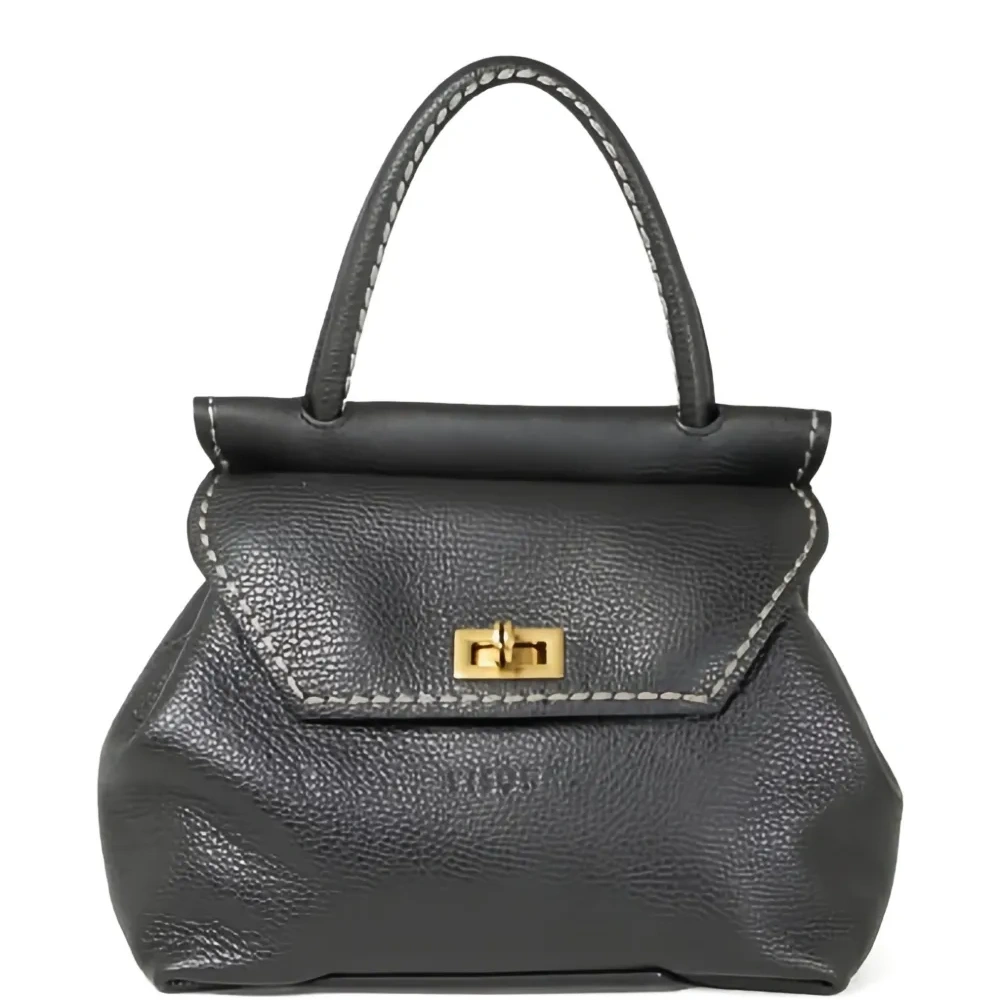 Кожаная сумка с поворотным замком