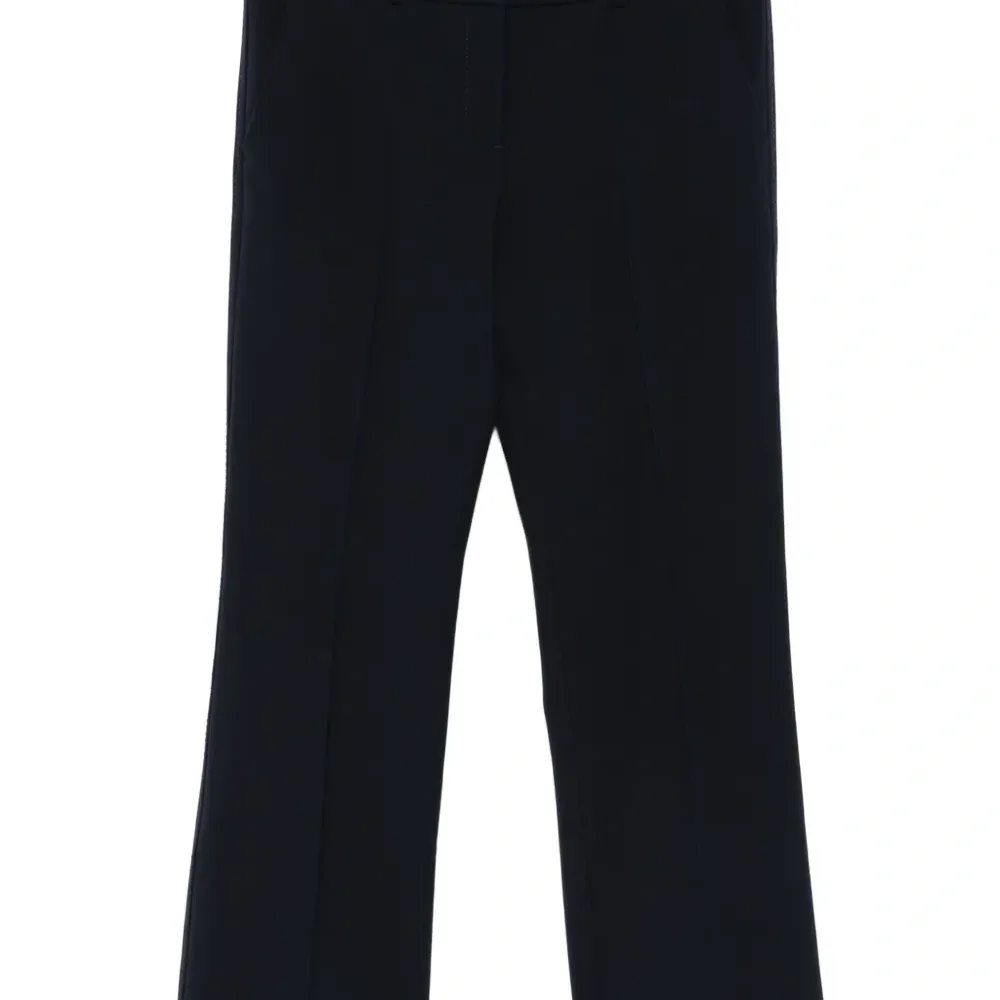 Брюки со складками